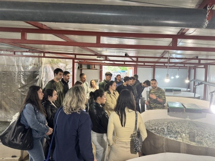 Students visiting sturgeon aquaculture facilities